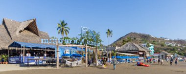 San Juan del Sur, Nicaragua - March 23, 2024: Restaurant at beach of San Juan del Sur coastal town on the Pacific Ocean in the Rivas department in southwest Nicaragua.