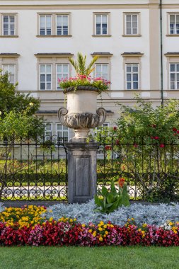 Beautiful baroque gardens of famous Mirabell Palace in the historic old town of Salzburg in Austria