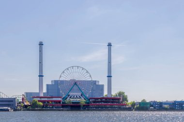Rotterdam , The Netherlands - May 9, 2025: Amusement park Rotterdam with ferry wheel in Rotterdam port city in South-Holland the west of the Netherlands. Opening soon.