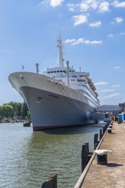 Rotterdam , The Netherlands - May 9, 2025: SS Rotterdam former cruise liner in the Maas harbor of Rotterdam in South-Holland the Netherlands. Hotel and enterntainment center.