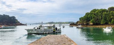 Ile-de-Brehat, France - June 12, 2025: Ferry boat arriving at little island Ile-de-Brehat Cotes-d'Armor coast in Brittany France