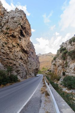 Continuous line on road. Road in mountain. The journey continues. High quality photo Continuous line on road. Road in mountain. . High quality photo