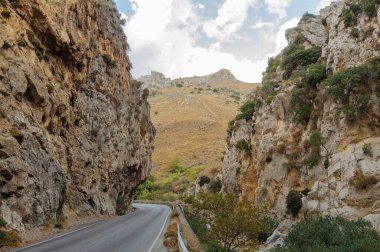 Continuous line on road. Road in mountain. The journey continues. High quality photo Continuous line on road. Road in mountain. . High quality photo