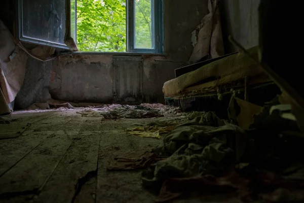 stock image rusty windows with broken glasses viewed from inside an abandonated house located at chernobyl radioactive exclusion zone. High quality photo