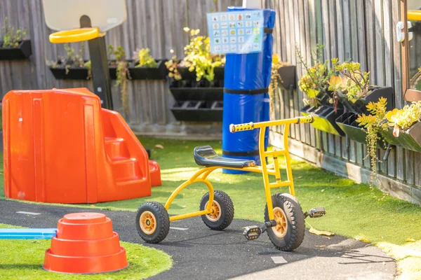 Cute Yellow Trike Kindergarten Yard People — Stock Photo, Image