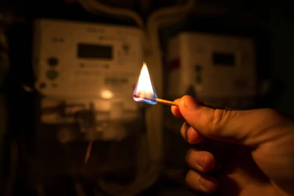 Man Hand Complete Darkness Holds Burning Match Read Home Electricity — Stock Photo, Image
