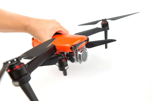 stock image drone in hand on a white background.