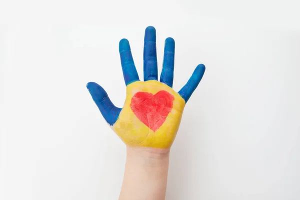 Blue Yellow Painted Children Hand Painted Red Heart Palm Support — Stock Photo, Image