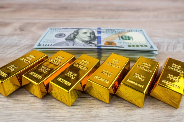 gold bars on dollars. Gold bars on money