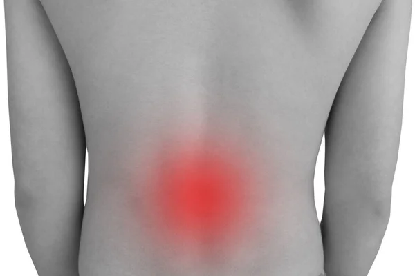 stock image Black and white photo of a back with back pain. The red color further illustrates the pain.