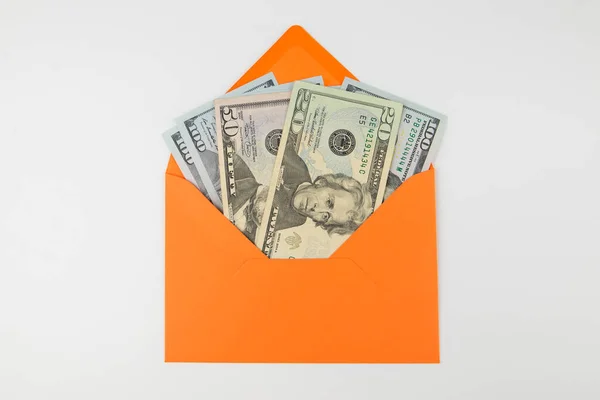 Dollari Una Busta Arancione Bianco Concetto Finanziario — Foto Stock