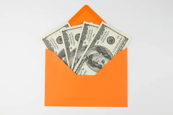 Dollari Una Busta Arancione Bianco Concetto Finanziario — Foto Stock