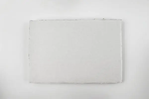 Kawałek Białego Kartonu Białym Tle — Zdjęcie stockowe