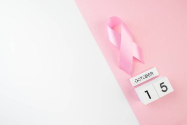 Meme Kanseri Farkındalığı Ayı. Pembe kurdele. Pembe Ekim Sembolü. Takvim.