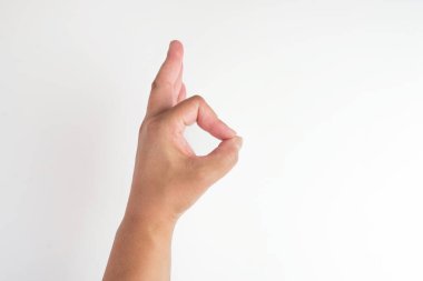 jest, beyaz arka planda elle izole edilmiş kırpma yolu da dahil. Kadın eli beyazın üstünde.