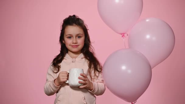 Adorable Caucasian Little Girl Takes Sip Sweet Cocoa Drink Hot — Stock Video