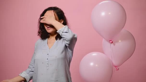 Charming Woman Covers Her Eyes Expressing Surprise While Receiving Gift — Stock Video