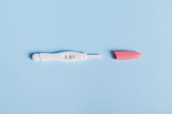 Isolated Shot Positive Pregnancy Test Kit Two Strips Blue Pastel — Stock Photo, Image