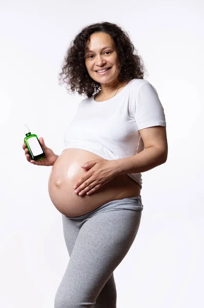 Multi Ethnic Beautiful Pregnant Woman Smiles Looking Camera Holds Mockup — Stock Photo, Image