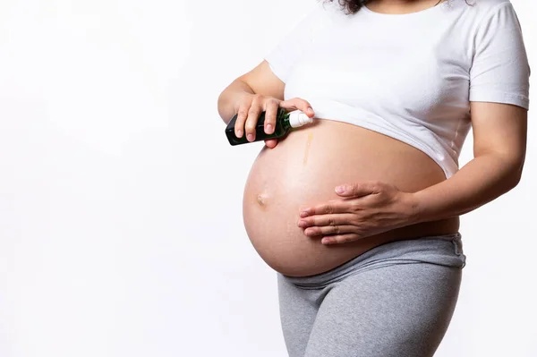 Close Pregnant Woman Rubbing Smoothing Cosmetic Product Her Big Belly — Stock Photo, Image