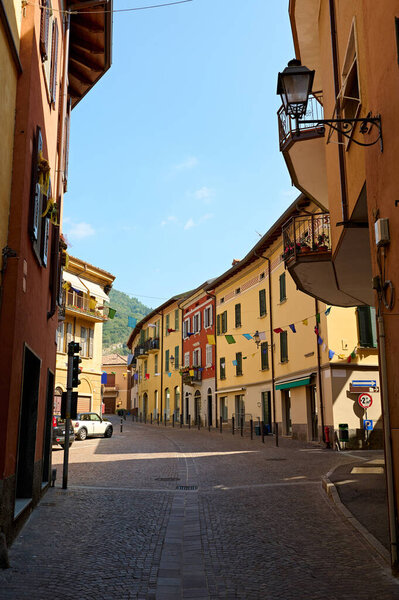 Still life. Medieval alley with various shops in Canzo, Lombardy, Italy. September 2023. Travel destination. Tourism