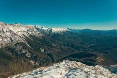 Blue sky over mount Cuarnan, friuli venezia-giulia, italy clipart