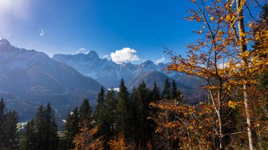 Clouds in the sky over mount Forno, friuli venezia-giulia, italy clipart