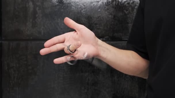 Hand Spins Professional Hairdressing Scissors Dark Background — Stock Video