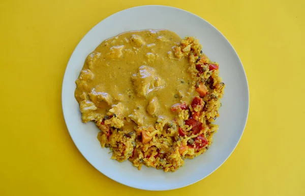 stock image Chicken cashew korma with rice and vegetable biryani