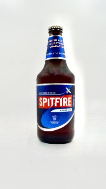 Sydney, Australia. December 2024. A closeup of a bottle of Spitfire amber ale against a white background.  clipart