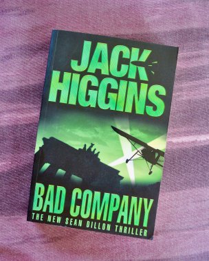 Sydney, Australia. December 2024. A closeup of the book cover of Bad Company by Jack Higgins.  clipart