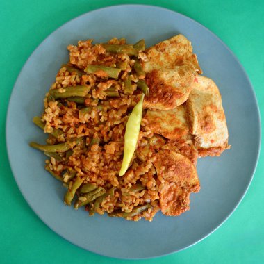 Peri Peri tavuğu domatesli pilav ve yeşil fasulye.. 
