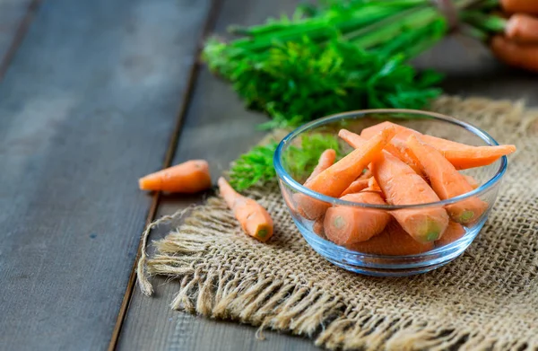 Baby carrots in glass cup, High Beta Carotene and help the body have immunity against colds. Prevent cancer and diseases related to bone, skin and eyes