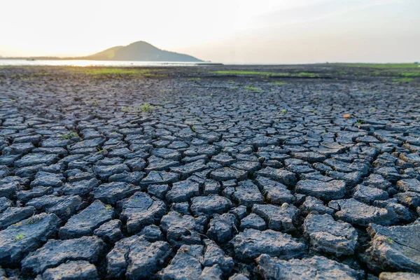 Stock image Cracked ground,Cray Soil,Mud Crack.Cracks on the surface of the earth are altered by the shrinkage of mud due to drought conditions of the terrain.