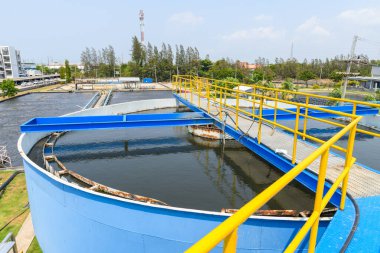 Aerated pool wastewater treatment system in industrial plants. environmental science and reuse waste water concept clipart