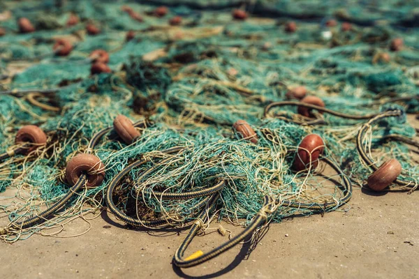 Stock image green fishing nets drying in the sun after fishing