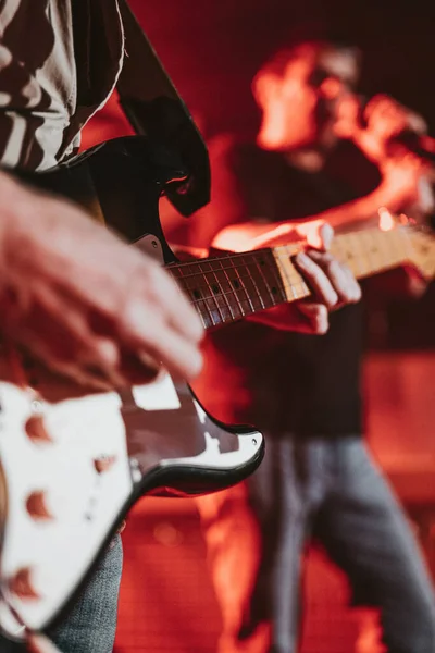 Man Playing Electric Guitar Concert Faces Shown Vertical Image Shallow — Φωτογραφία Αρχείου