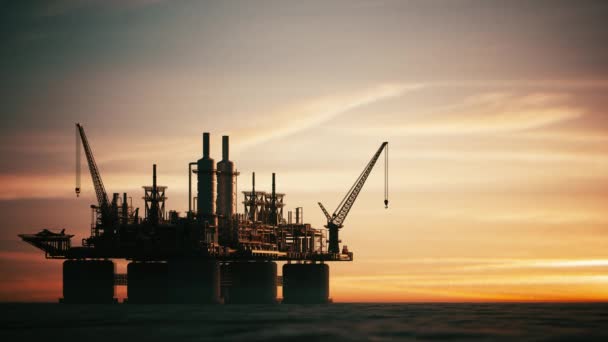 日没時に海洋のオフショア石油プラットフォーム 海洋のオフショアジャッキアップ掘削リグ — ストック動画