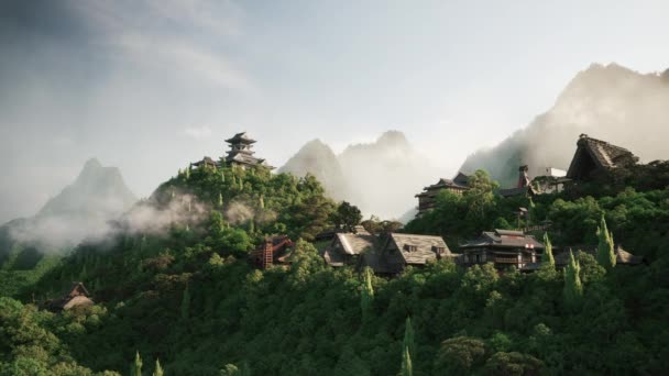 山上的小聚居地森林群山顶上的一个小镇 日出时分的森林群山 — 图库视频影像