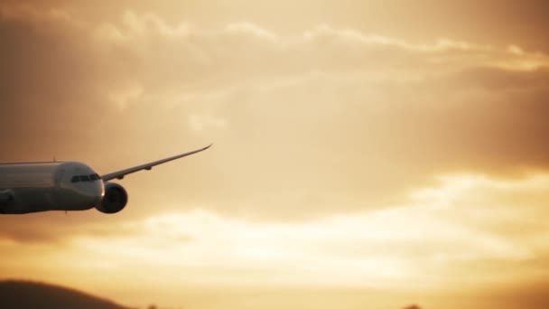 Lentokone Laskeutuu Auringonlaskun Aikaan Matkustajakone Laajentaa Laskutelineitä Laskua Varten Matkustajakone kuvapankkivideo