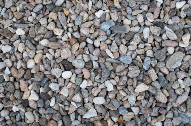 Birçok renkli nehir çakıl taşları sizi kapatır.