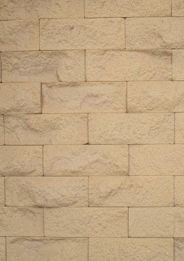 Yeni sarı kumtaşı duvarı kapat