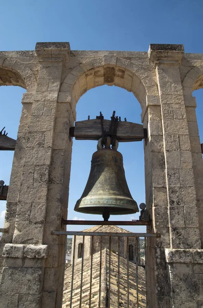 One or bells on bell tower of church Chiesa di San Carlo al Corso in Sicily, Italy, Europ