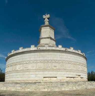 Reconstruction of the cylindrical Tropaeum Traiani or Trajan Trophy in city Adamclisi, Constanta, Romania, Europ clipart