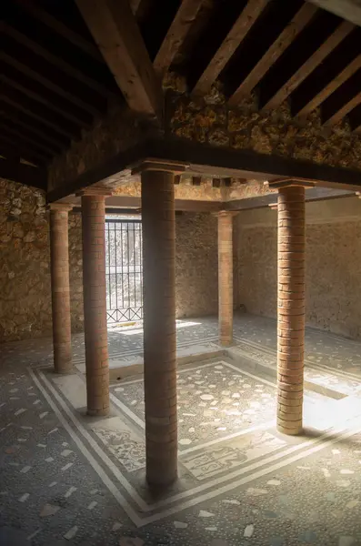 stock image Small courtyard of a house in Pompeii with a colonnade and a pool in Italy, Europ