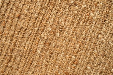 Yeni sıkı kahverengi örülmüş halı...