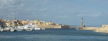 Coastline of old town Chania with port, lighthouse and fortress venetian Firka in Crete, Greece, Europ clipart