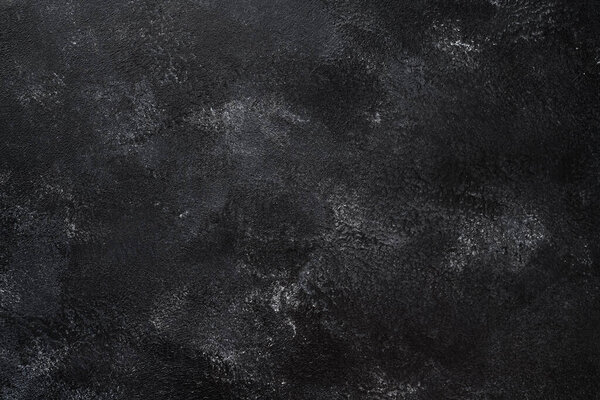 Grunge black stone background or texture with space