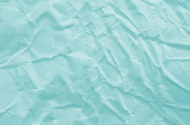 Buruşmuş kağıtlarla kaplanmış yaratıcı bir arka plan..