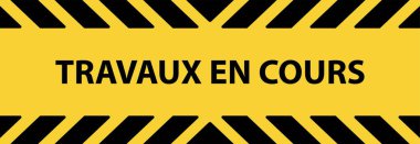 Sarı arkaplandaki travaux 'nun metni. Fransızca dilinde çalışma devam ediyor.